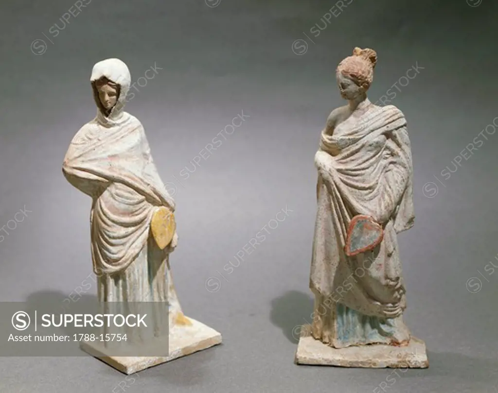 Terracotta female statuettes, from Tanagra, Greece