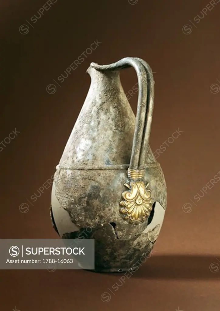 Silver oinochoe or jug with gold plated decoration of handle, from Tomb Regolini Galassi, Cerveteri, Italy