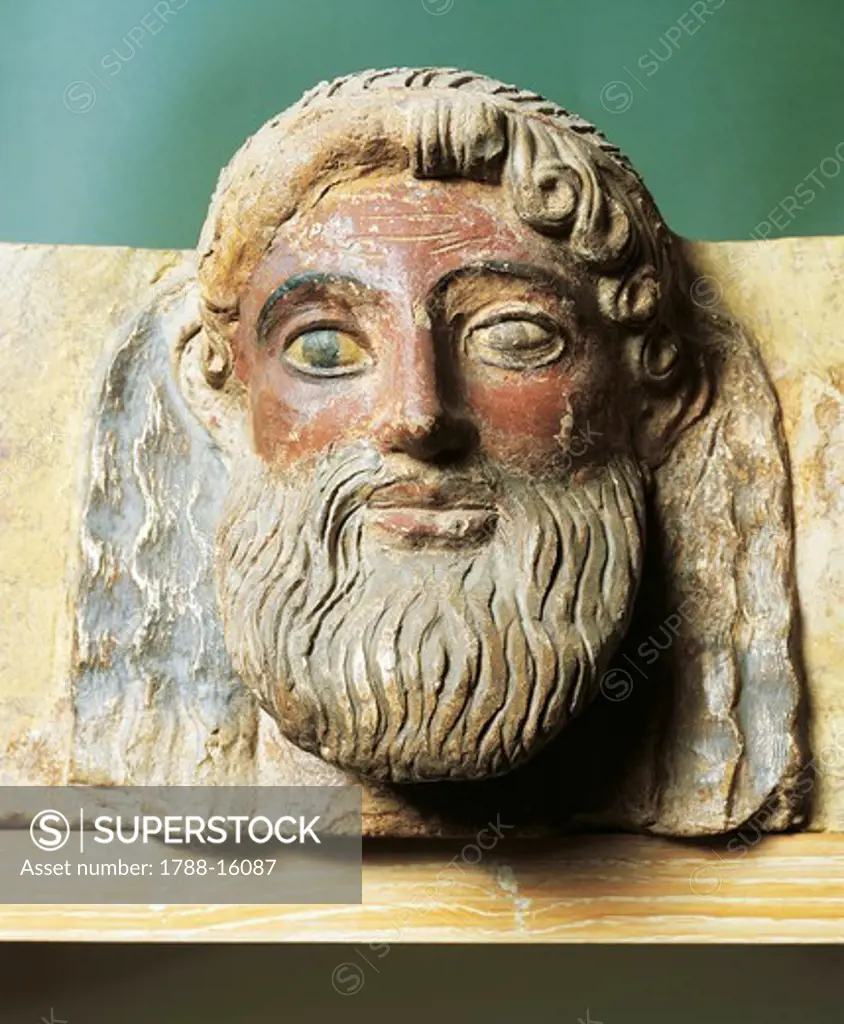 Greek civilization, Terracotta antefix depicting bearded head, From Temple of Apollo at Thermon, Greece