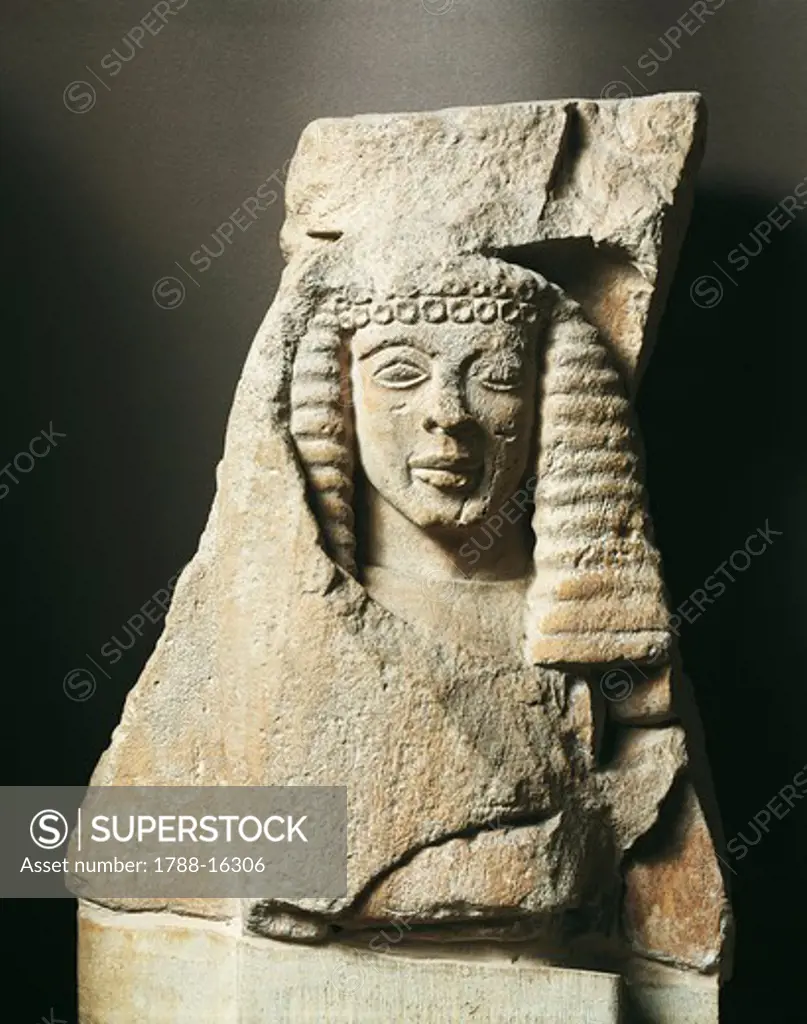 Limestone fragment of female figure, from Mycenae