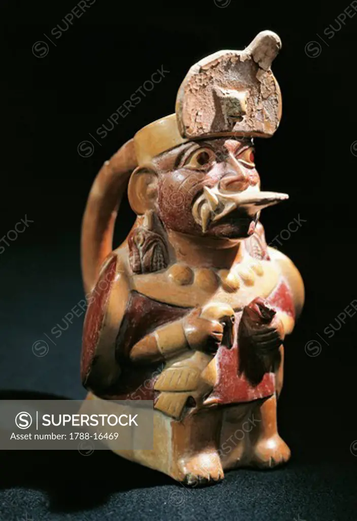 Anthropomorphic polychrome terracotta vessel in shape of priest holding sacrificial animals, Pre-Inca civilization, Peru, Moche culture