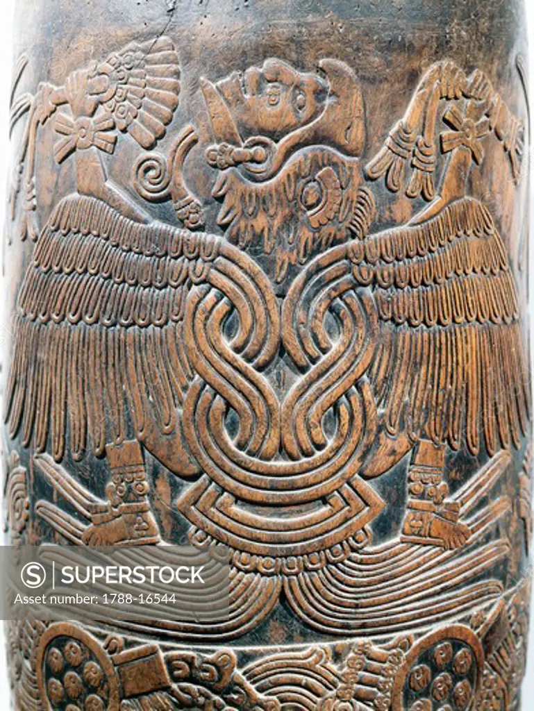 Wooden drum with relief depicting eagle-knight warrior, from Mexico