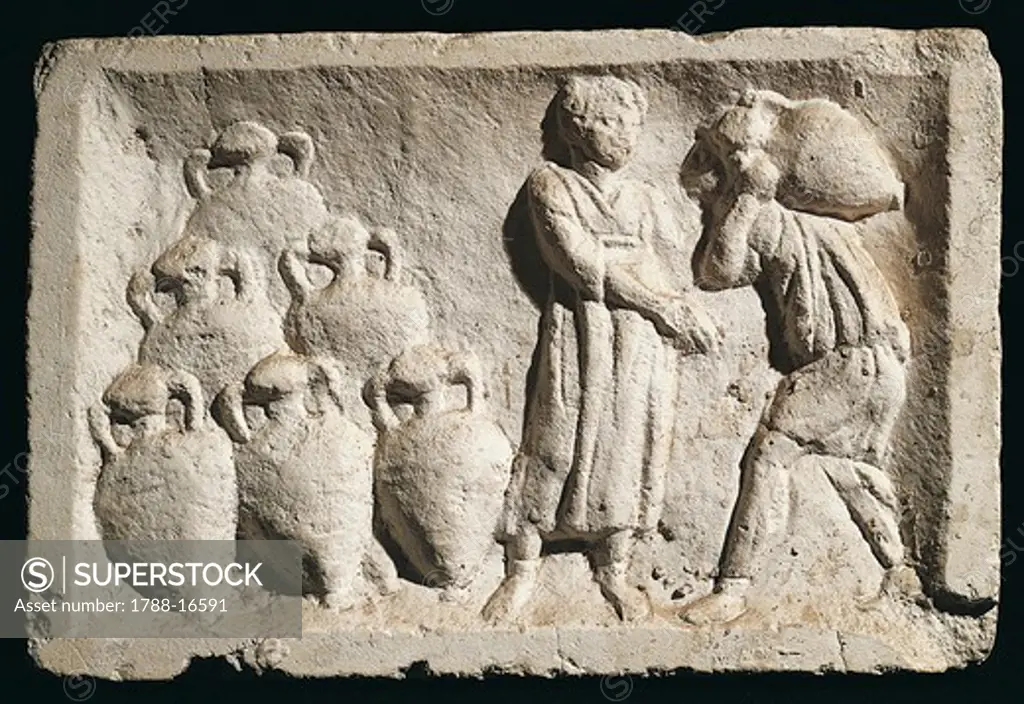 Relief depicting people carrying amphorae in wine cellar