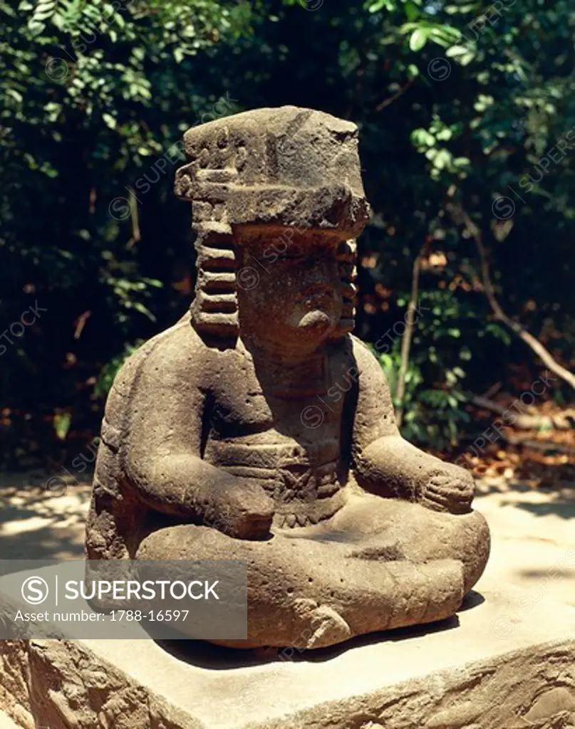 Mexico, Tabasco, Villahermosa, Olmec sculpture representing High Priest, at La Venta archaeological park and museum