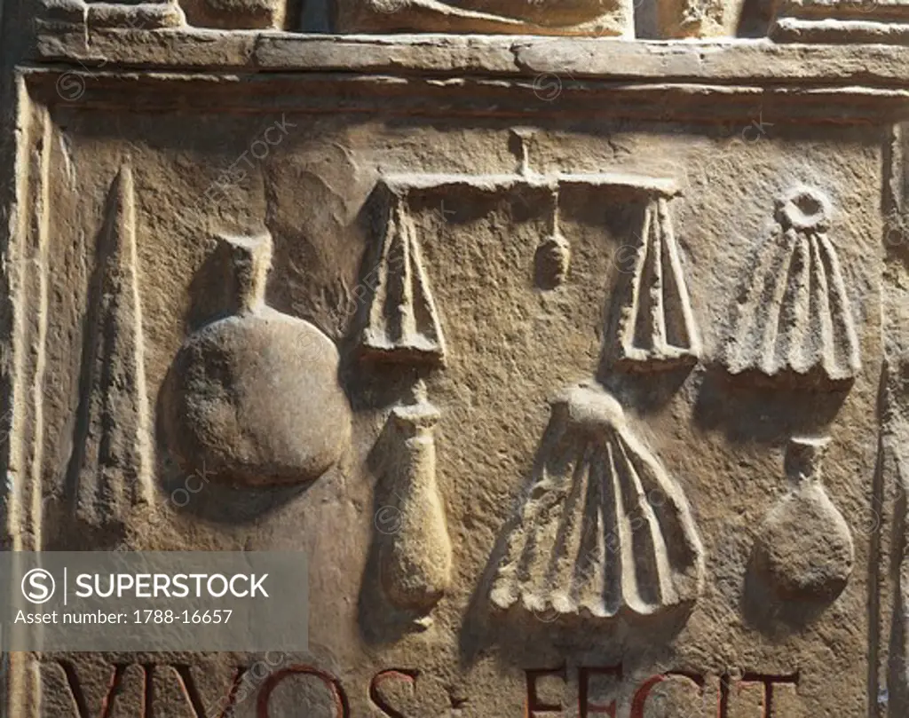 Relief depicting tools of the trade, on Stele of dyer Gaio Pupuio Amico