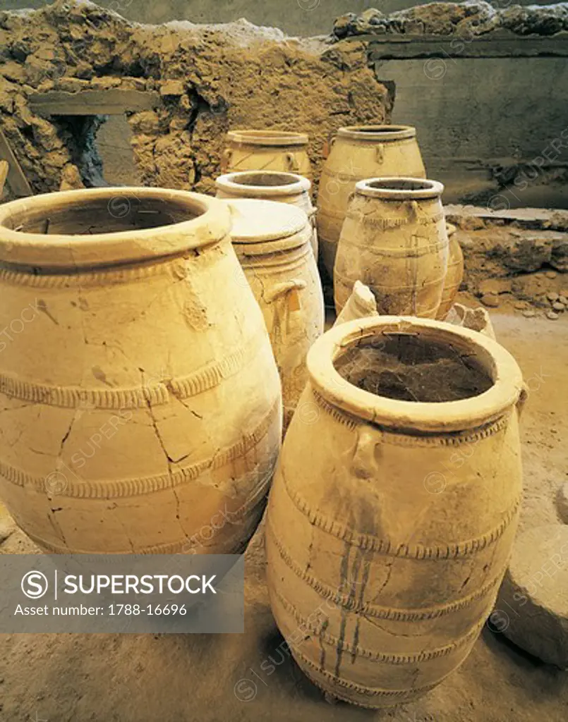Greece, Cyclades Islands, Santorini, Island of Thera, pithoi storage jars at Akrotiri archaeological site