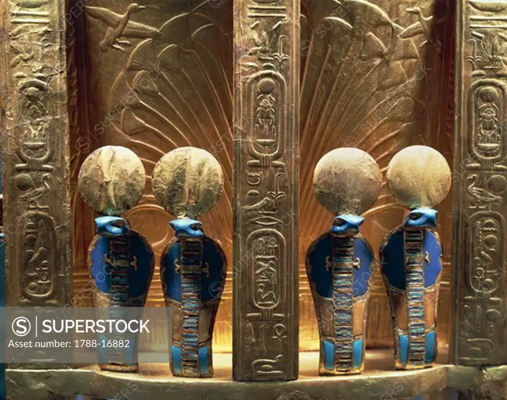 Treasure of Tutankhamen. Throne of Tutankhamen. Detail, four uraei crowned with sun discs, New Kingdom, Dynasty XVIII