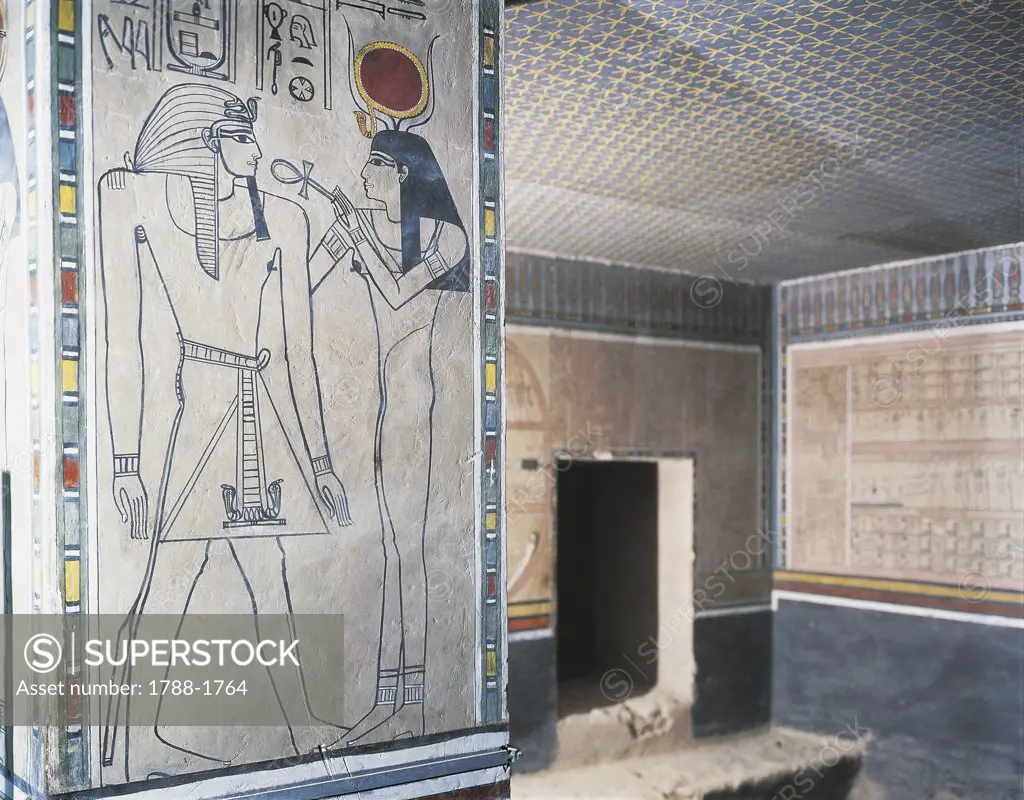 Egypt - Ancient Thebes (UNESCO World Heritage List, 1979). Valley of the Kings. Tomb of Amenophis II. Burial chamber. Pillar with a depiction of goddess Isis with an ankh (symbol of life) and the dead pharaoh