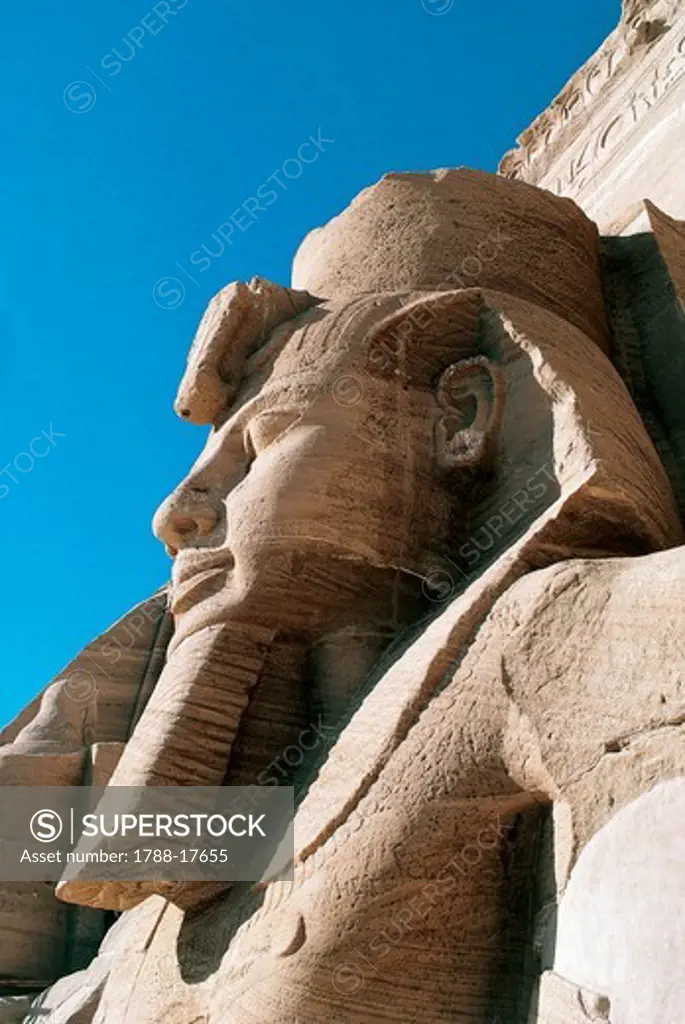 Egypt, Nubia, Abu Simbel, Great Temple of Ramses II, colossal statue of Ramses II