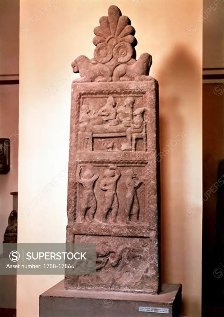 Fiesole stele with relief depicting funerary banquet, dance scene and fight between animals