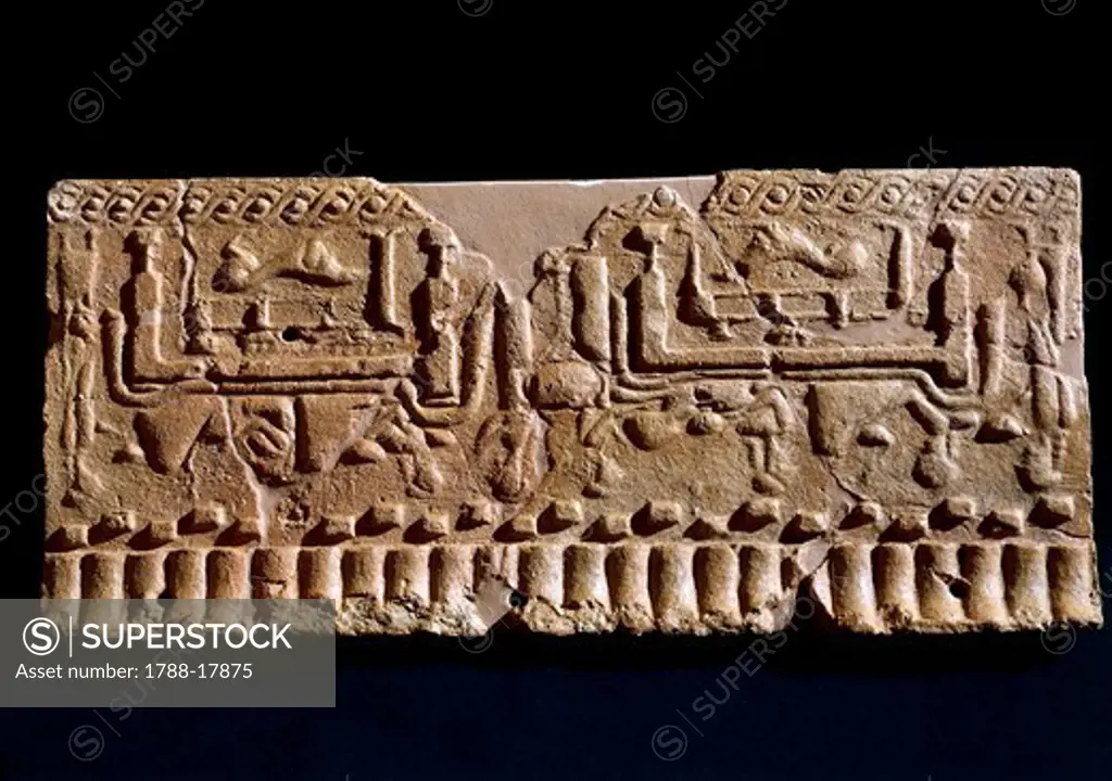 Clay slab with decoration of Corintian style representing banquet scene, from Murlo, Tuscany region, Italy