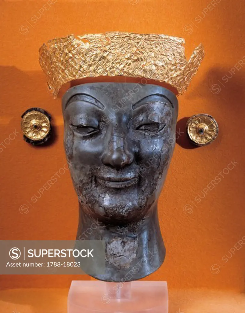 Head of Artemis with gold diadem and earrings