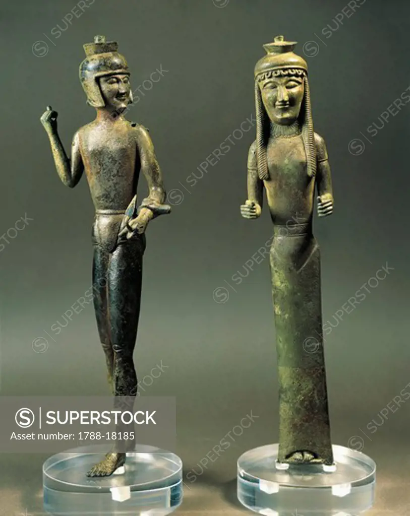 Bronze statuettes representing warrior and woman, possibly base for furniture, 550 B.C. from Brolio, Val di Chiana, Tuscany, Italy