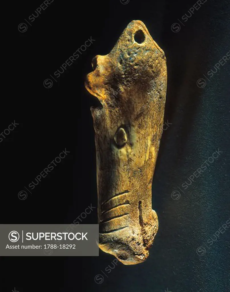 Carved bone in shape of horse head, from Riparo Gaban at Martignano (Trentino-Alto A.D.ige region, Italy)