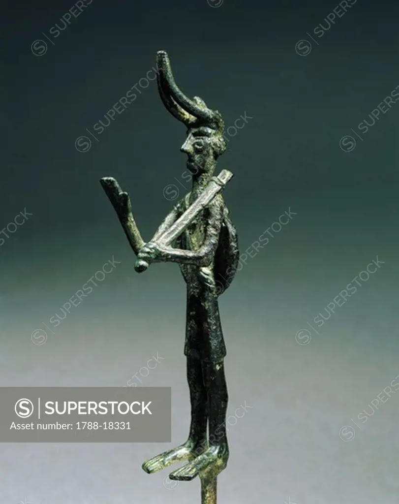 Bronze statuette of praying soldier