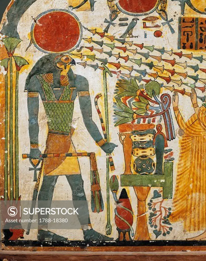 Painted wood stele of Lady Taperet, depicting sun god Ra emanating rays in shape of lotus
