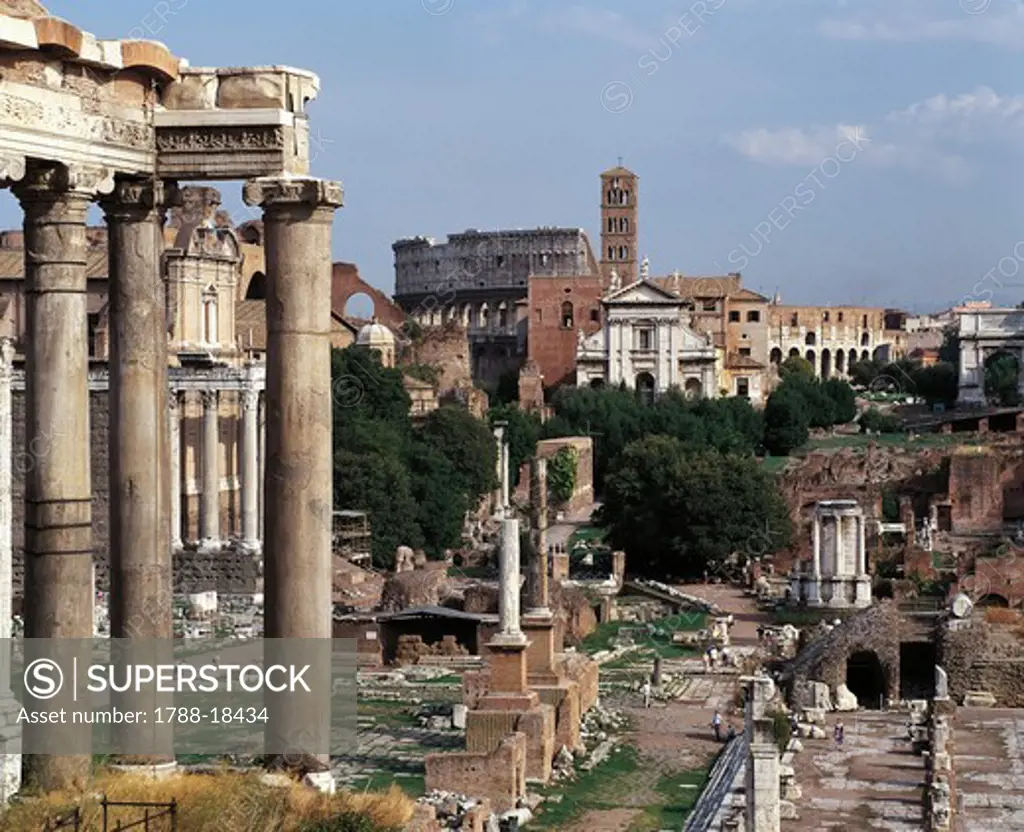 Italy, Latium region, Rome, Imperial Fora, Temple of Saturn, Via Sacra, Temple of Vesta and church of Santa Francesca Romana in background