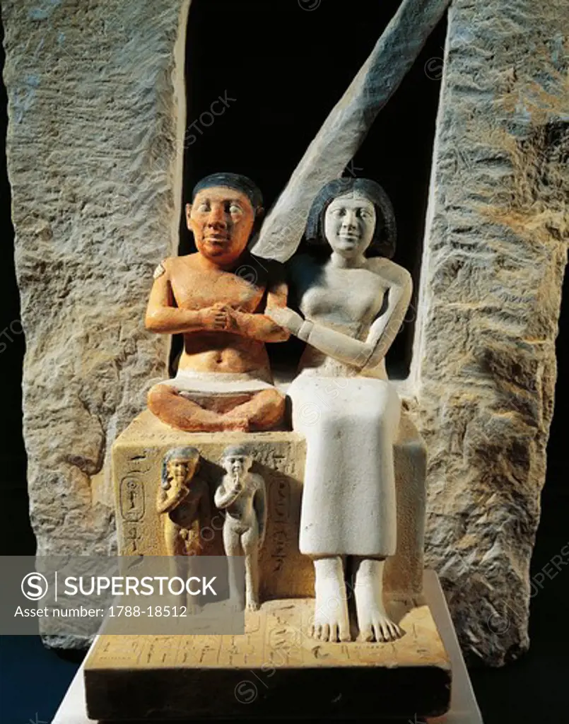 Statue of dwarf Seneb with wife Sentiotes and children, from Giza