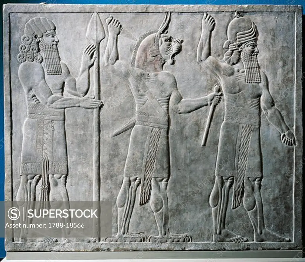 Relief with protective deities, from Nineveh