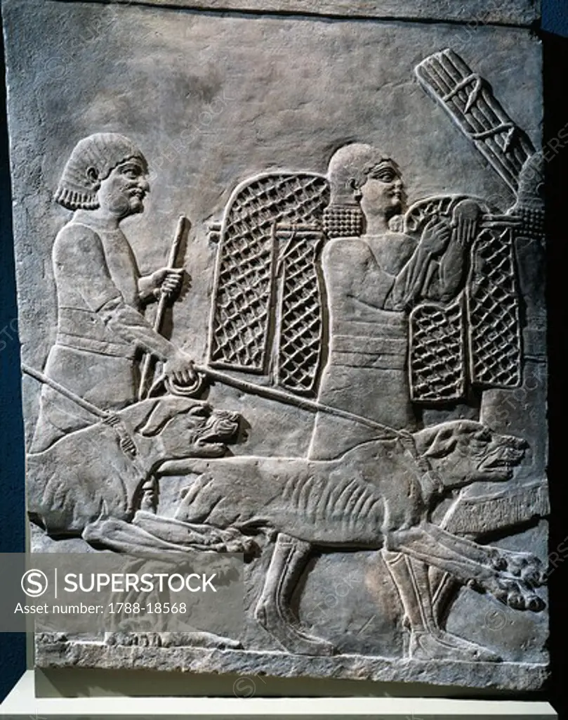 Relief of hunting scene with dogs and traps, from Nineveh