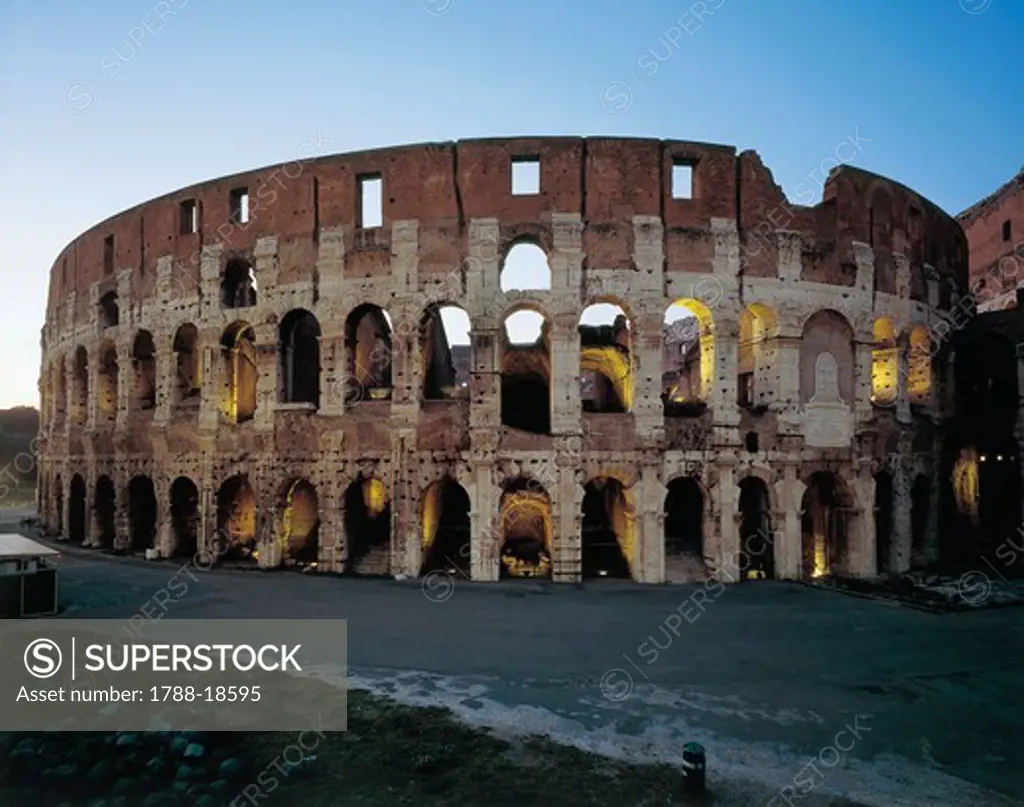 Italy, Latium region, Rome, Flavian amphitheater Colosseum at dusk