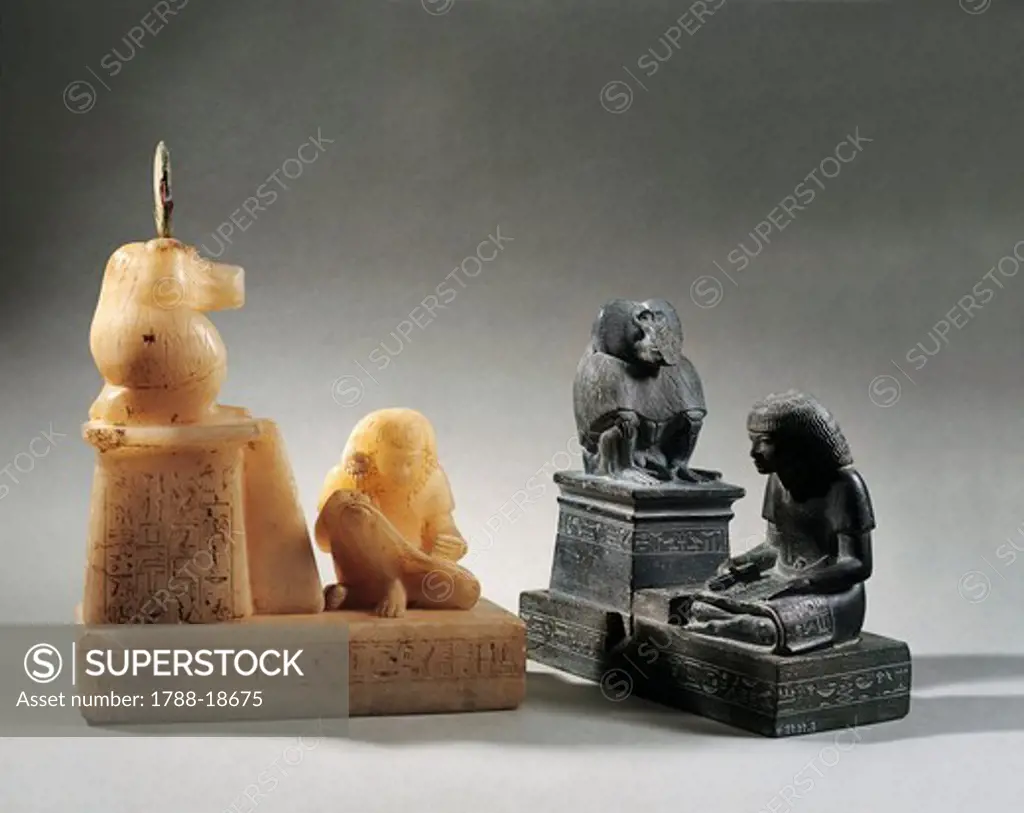 Alabaster and bronze statues of god Nehmertuf with god Thoth as a baboon