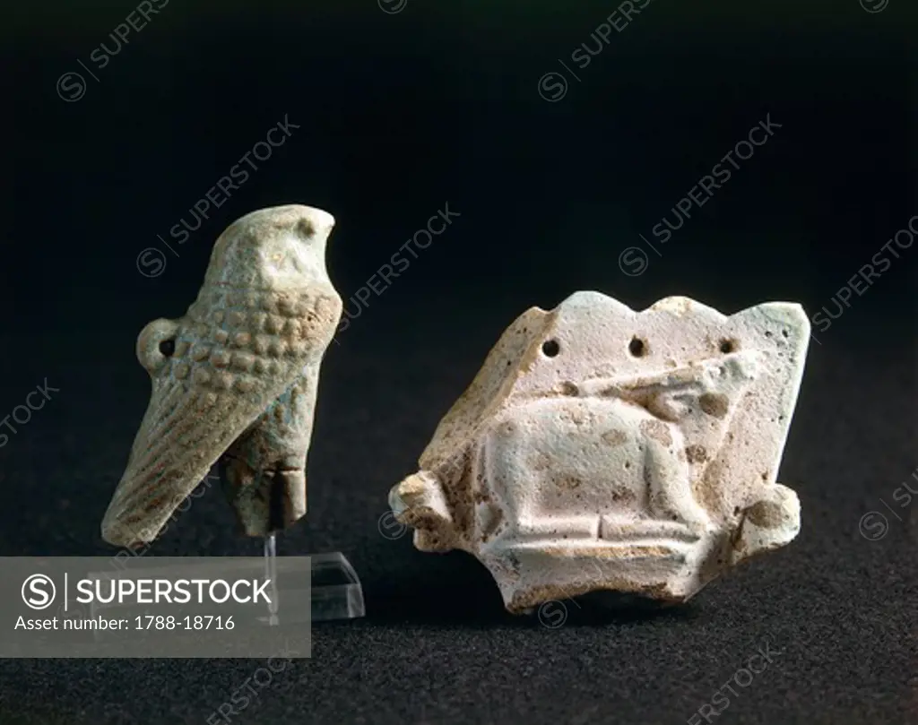 Amulets of an oryx and of god Horus portrayed as a hawk