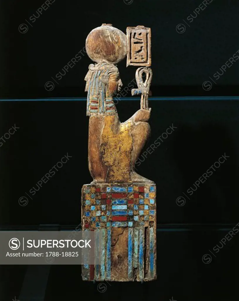 Gilded and glass inlaid decoration depicting the goddess Maat, from piece of furniture