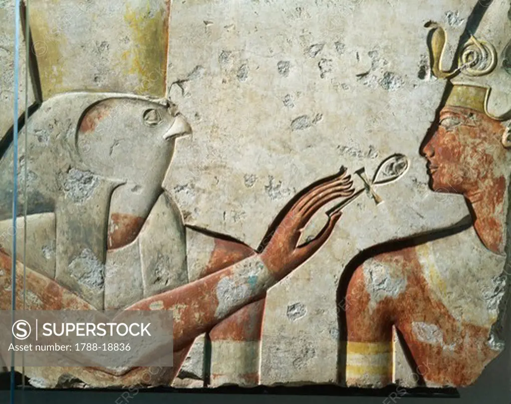 Falcon god Horus and Ramses II during the opening of the mouth ceremony, bas-relief, from small temple built by Pharaoh at Abydos.