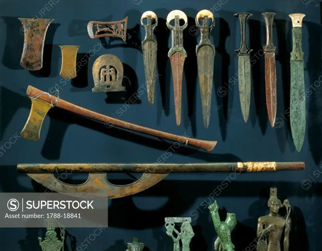 Ancient Egyptian bronze axes and daggers with electrum blades and ivory handles