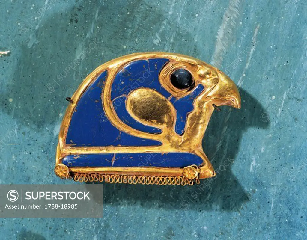 Gold and lapis lazuli jewel representing the head of Horus