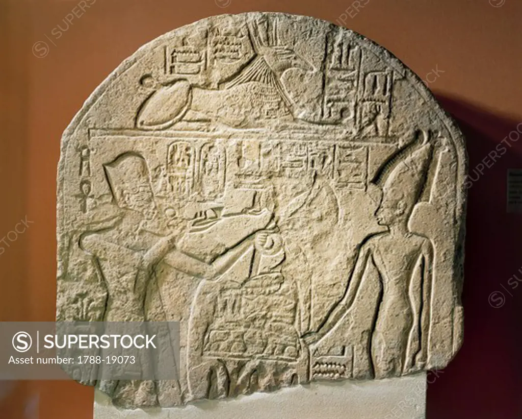 Limestone stele depicting Ramses II offering incense and papyrus to the goddess Astarte