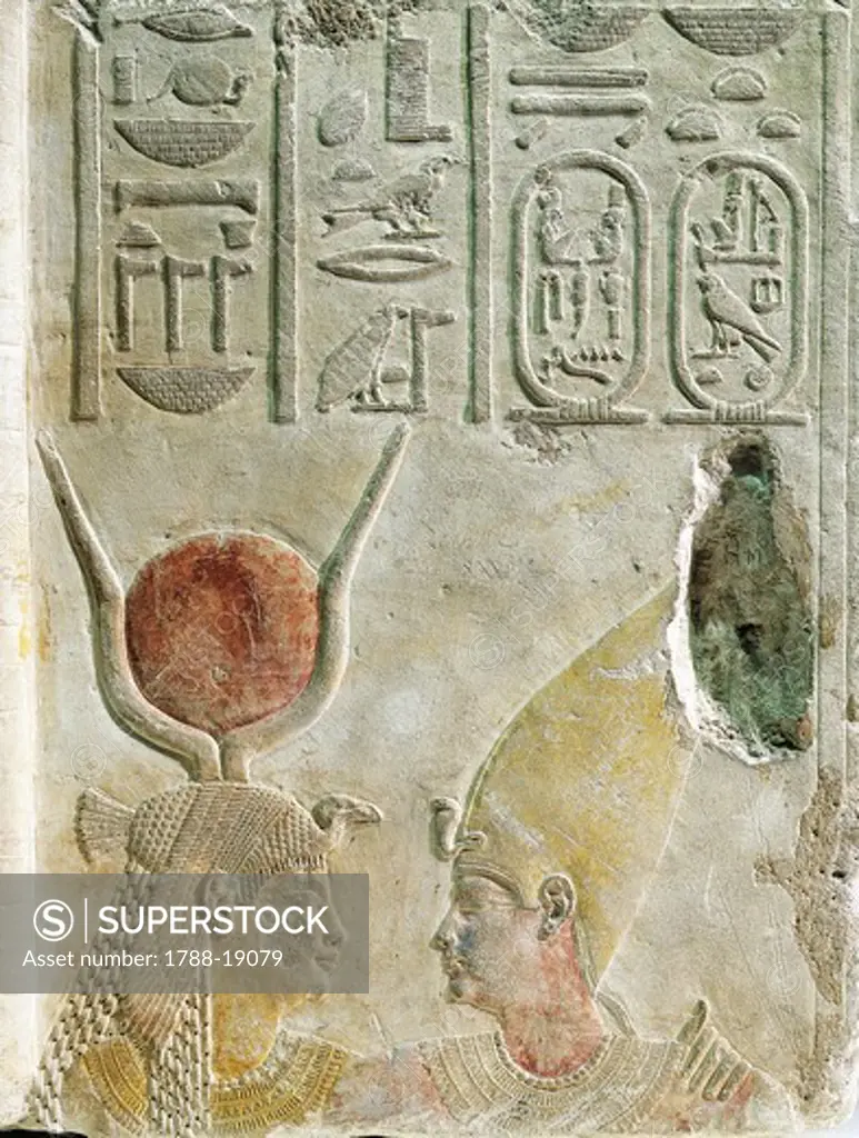 King Nectanebo II (360-343 BC) welcomed by goddess Isis, painted limestone relief