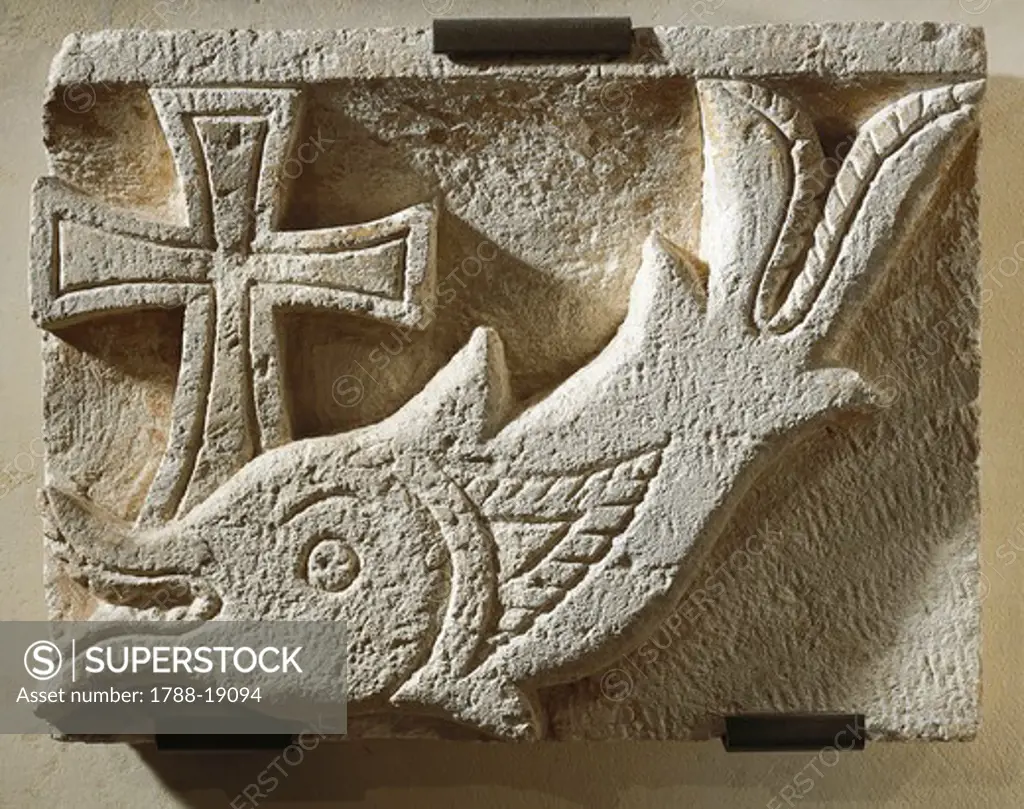 Relief depicting a fish and a cross