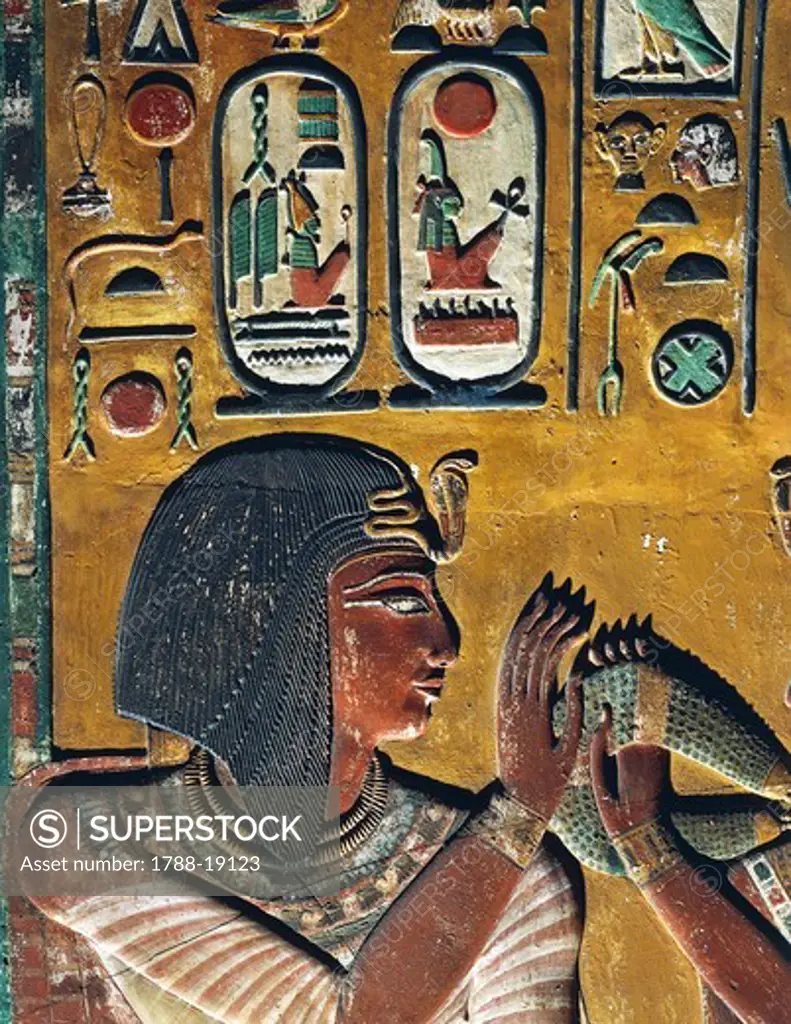 Goddess Hathor offers her necklace to the Pharaoh, painted relief, detail with Pharaoh