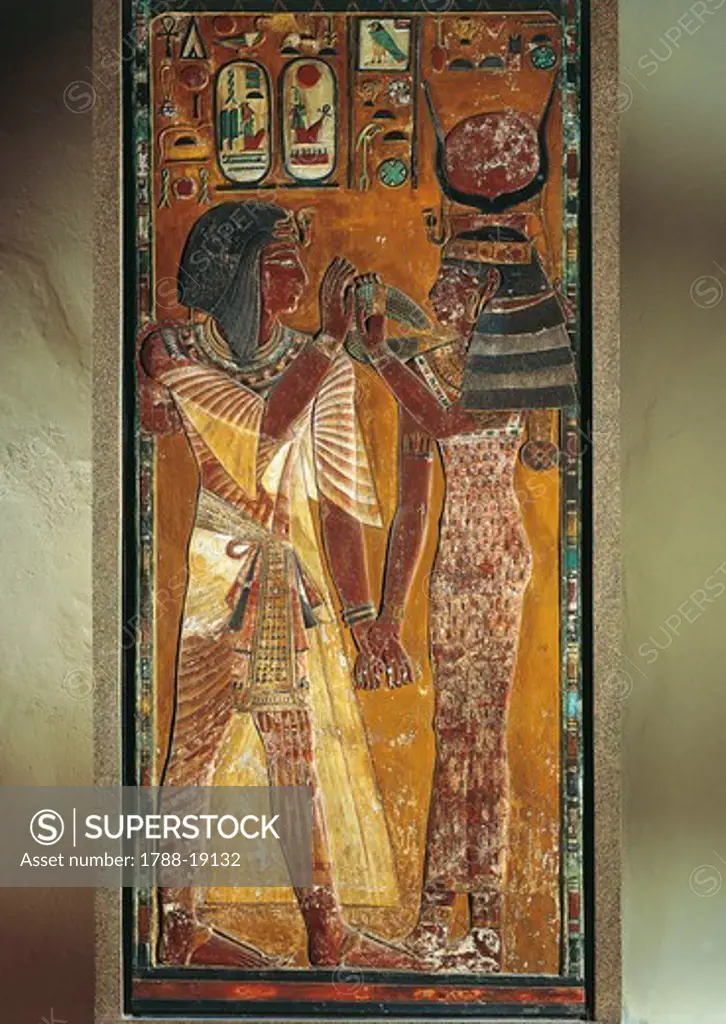 Goddess Hathor offers her necklace to the Pharaoh. Painted relief from a pillar of the tomb of Seth I at Thebes