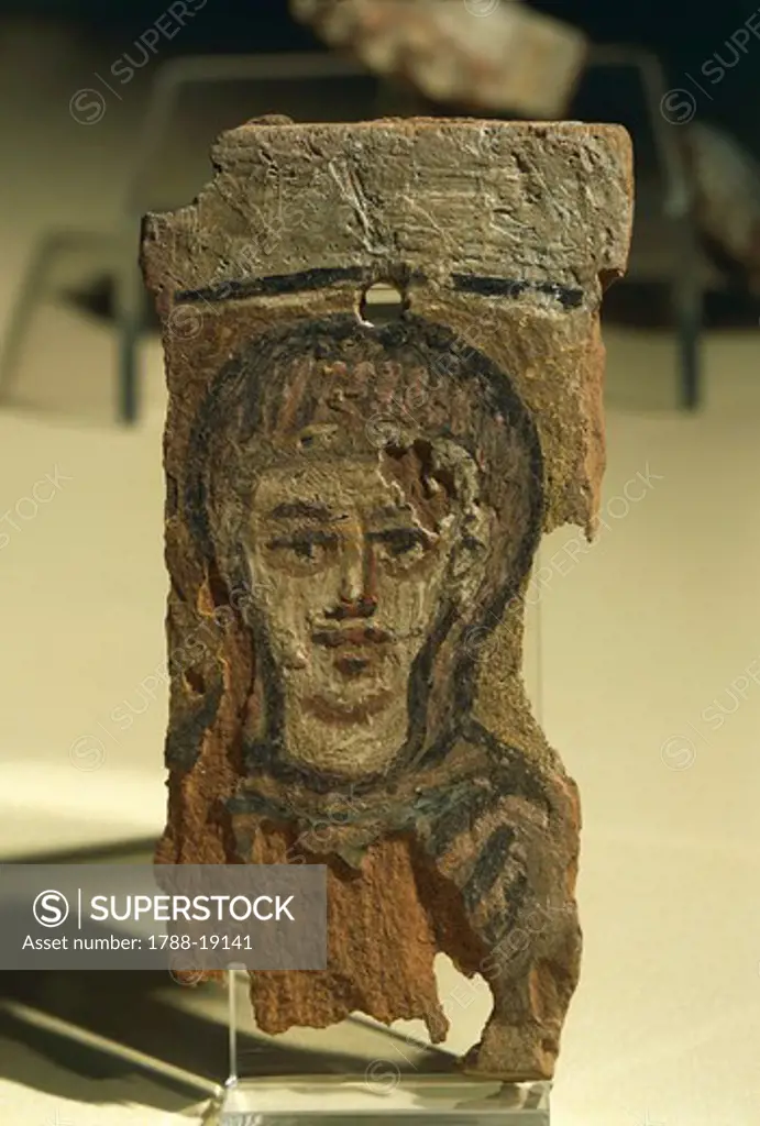 Figure of a woman, painted wood fragment