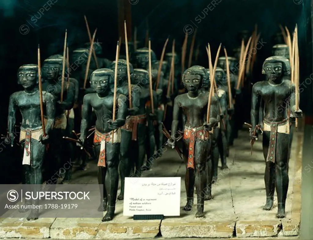 Nubian archers, painted wooden statues from Assiut