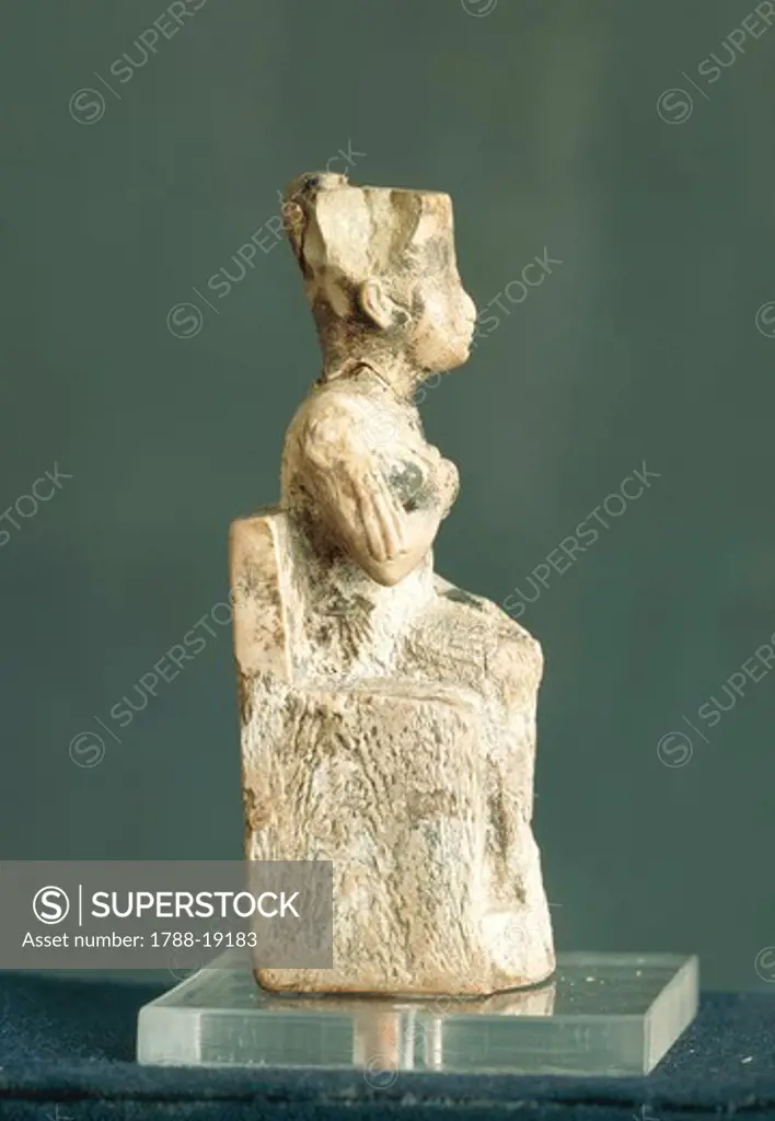Ivory statuette of Khufu from Abydos, side view
