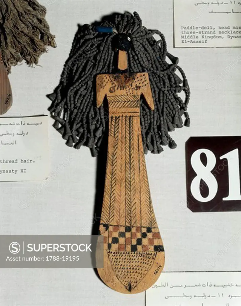 Painted wooden doll from Thebes