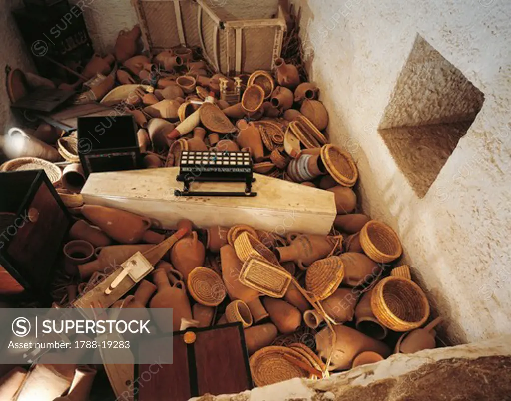 Replica of hiding-place beside sarcophagus chamber with pottery and baskets, from King Tutankhamen's tomb