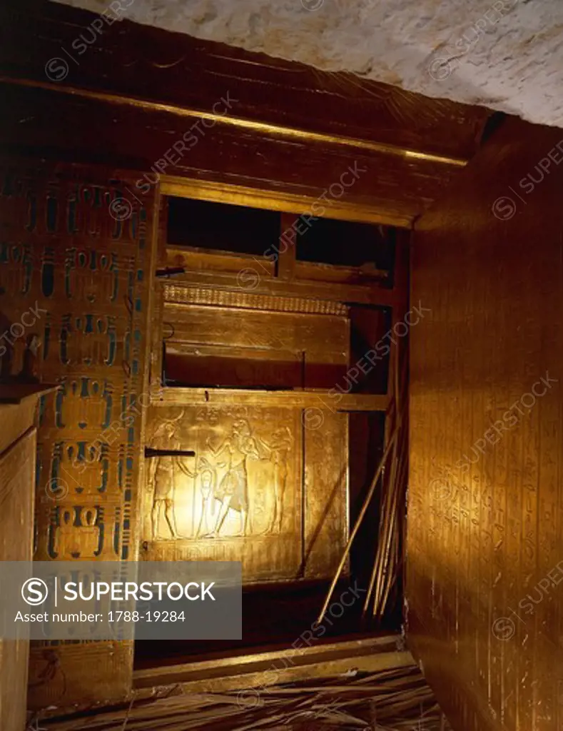 Replica of gilded wooden catafalque containing mummy, from King Tutankhamen's tomb