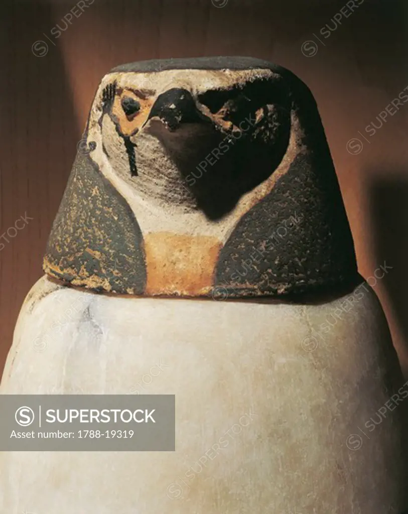 Canopic jar depicting falcon-headed Qebehsenuef, protector of intestines
