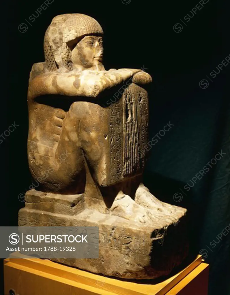 Cube shaped statue of priest Ptahmose, during reign of Amenhotep III