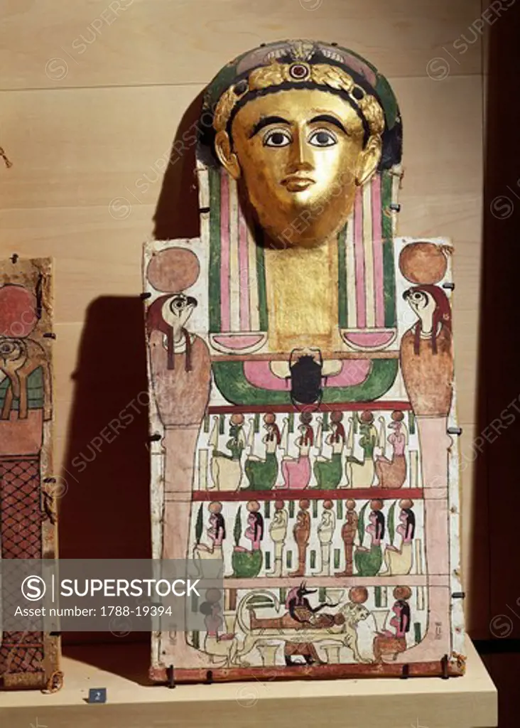 Plastered, painted and gilded linen cartonnage of mummy of Crates, from Dayr al-Madinah