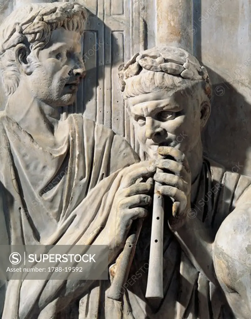Fragment of relief depicting preparations for sacrifice, from Rome, Detail of double flute player announcing emperor's entrance