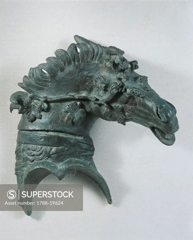 Bronze part of bed head shaped as mule head, crowned with vine leaves, From Volubilis (Morocco)