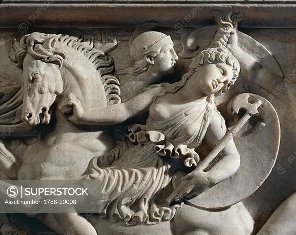 Marble sarcophagus with marble group on lid representing deceased couple and relief depicting battle between Greeks and Amazons, detail of Amazon on horse with her hair being pulled, from Thessaloniki