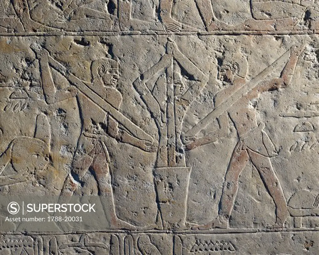 Reliefs from the mastaba of Kemrehu. Detail: wheat grinding with pestle