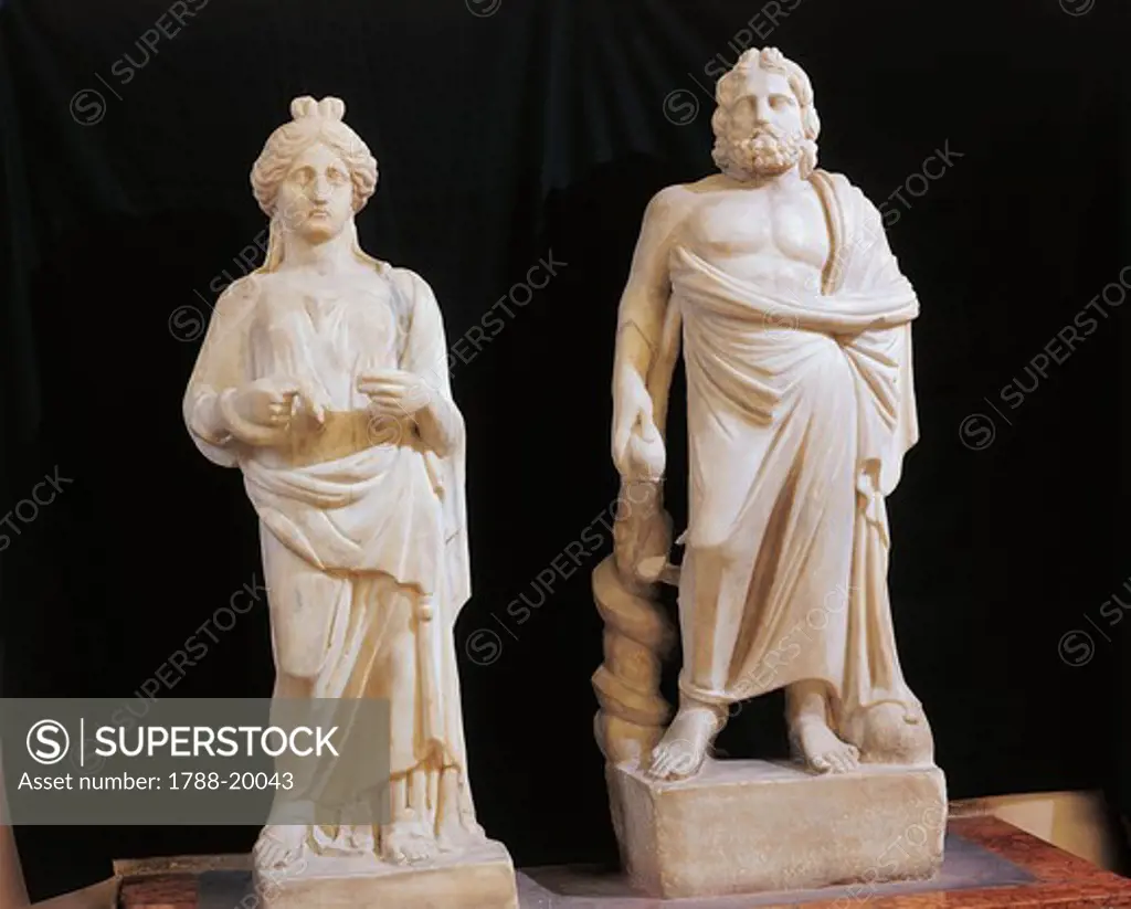 Marble statue of Asclepius, god of medicine, and his daughter Hygieia, goddess of health, from Mohamara Sidi-Bishr